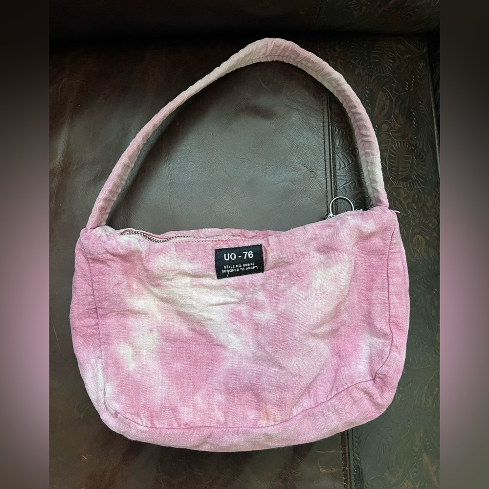 Urban Outfitters distressed pink purse